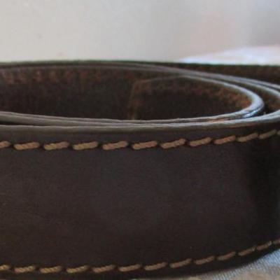 3 leather belts, one is Bill Blass alligator pattern size 42, one Leather woven belt size 42,  one brown leather belt with elk buckle...