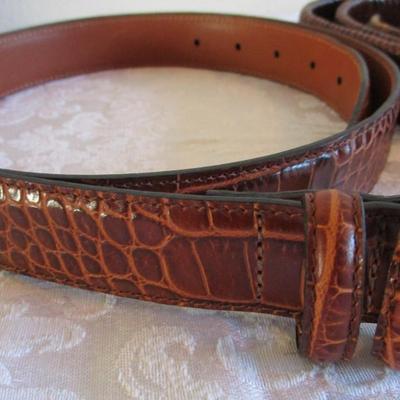 3 leather belts, one is Bill Blass alligator pattern size 42, one Leather woven belt size 42,  one brown leather belt with elk buckle...