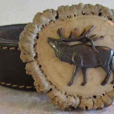 3 leather belts, one is Bill Blass alligator pattern size 42, one Leather woven belt size 42,  one brown leather belt with elk buckle...