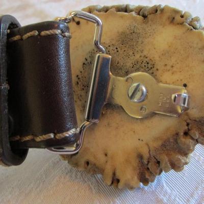 3 leather belts, one is Bill Blass alligator pattern size 42, one Leather woven belt size 42,  one brown leather belt with elk buckle...