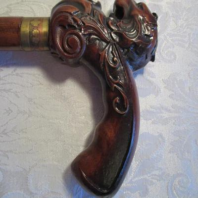 Lion head wood cane