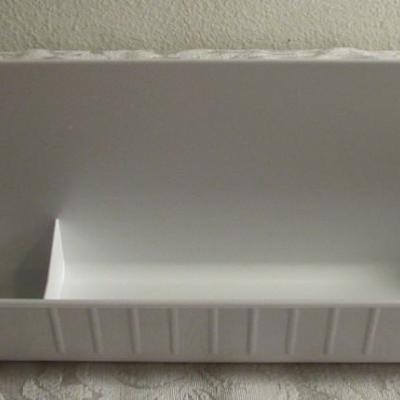 Rev-A- Shelf molded sink tip-out trays with hinges