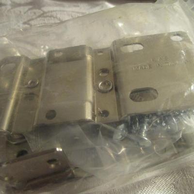 Rev-A- Shelf molded sink tip-out trays with hinges