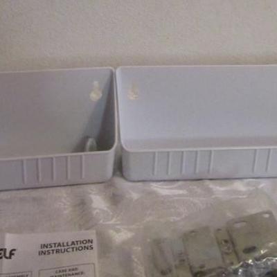 Rev-A- Shelf molded sink tip-out trays with hinges