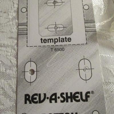 Rev-A- Shelf molded sink tip-out trays with hinges