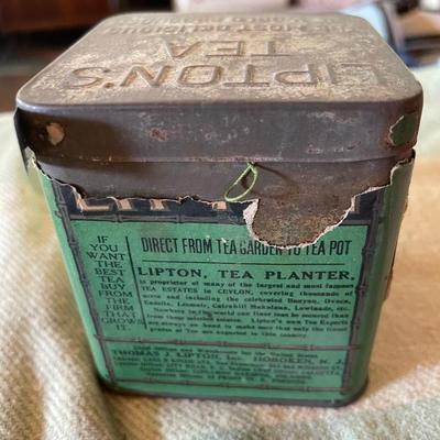 Lipton tea tin full of thread