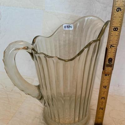 Pressed glass pitcher