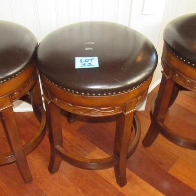 Lot 32-Three Backless Bar Stools