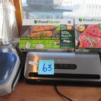 Lot 63-Foreman Lean Machine, Food Saver with bags Etc.