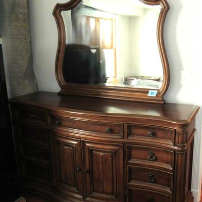 Lot 81-Haverty dresser with Mirror, 9 drawers and 3 shelves