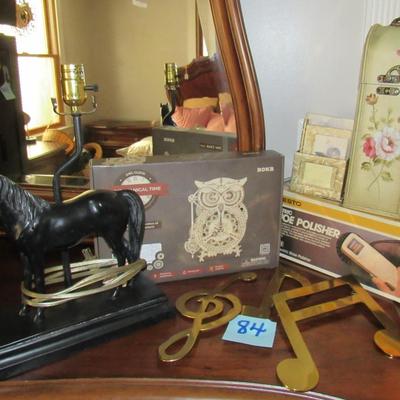Lot 84-Brass Musical Symbols, Decorative Horse Lamp, Roke Owl Clock Etc.