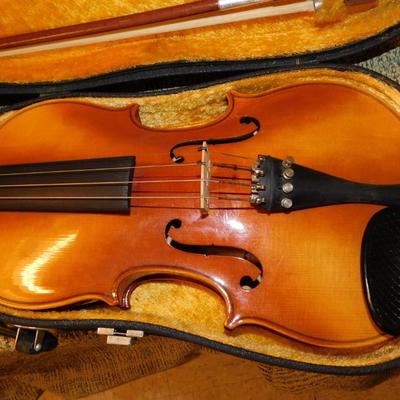 Sale Photo Thumbnail #215: Comes with case, which has signs of age and wear, nice interior. Violin is in excellent condition. Comes with two bows, extra strings, rosin and mute.