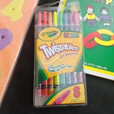 Foam number puzzle, Twistable Crayola's, stuffed animals and a small child sized backpack