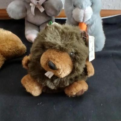 Foam number puzzle, Twistable Crayola's, stuffed animals and a small child sized backpack