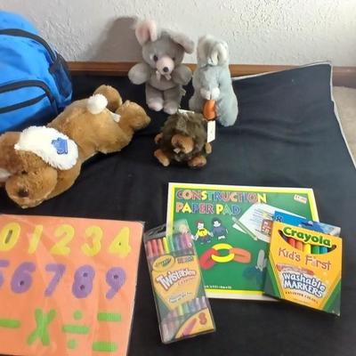 Foam number puzzle, Twistable Crayola's, stuffed animals and a small child sized backpack