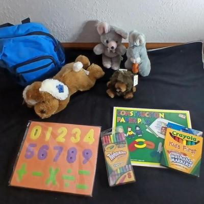 Foam number puzzle, Twistable Crayola's, stuffed animals and a small child sized backpack