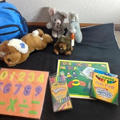 Foam number puzzle, Twistable Crayola's, stuffed animals and a small child sized backpack