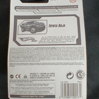Tonka trucks - and two hot wheels cars in packaging