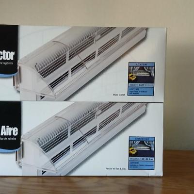 Two brand new Deflect-o Air Deflectors for vents and a 6" clip on fan