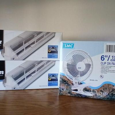 Two brand new Deflect-o Air Deflectors for vents and a 6" clip on fan