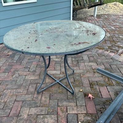 Lot 87 - Round Glass Top Patio Table