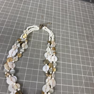 Sand Dollar Pendant and Mother of Peal. 
