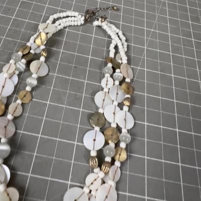 Sand Dollar Pendant and Mother of Peal. 