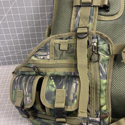 NOMAD Backpack with a soft seat and load shelf with a vest 