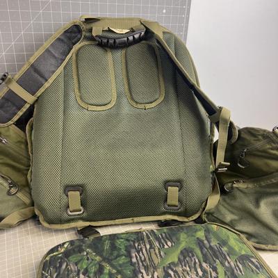 NOMAD Backpack with a soft seat and load shelf with a vest 