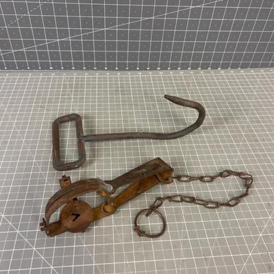 Leg Hold Trap and a Forged Hook 