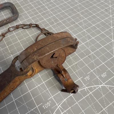 Leg Hold Trap and a Forged Hook 