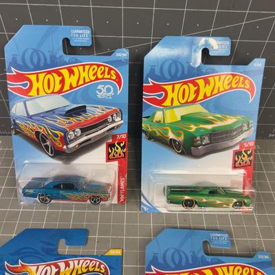 4 NEW Hot Wheels On the Card