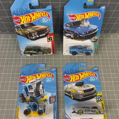 4 NEW Hot Wheels On the Card