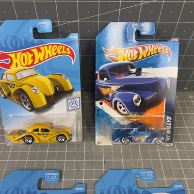 4 NEW Hot Wheels On the Card