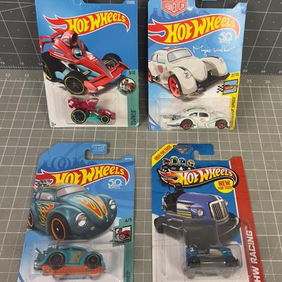 4 NEW Hot Wheels On the Card