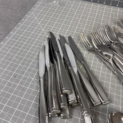 Stainless Steel Service for 8 Less teaspoons 
