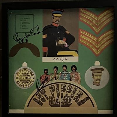 The Beatles Sgt. Pepper Lonely Hearts Club Band autographed album insert. GFA Authenticated