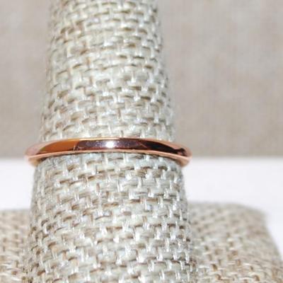 Size 9¼ Light Blue Transparent Rectangle Stone Ring on a Rose Gold Band (3.8g)