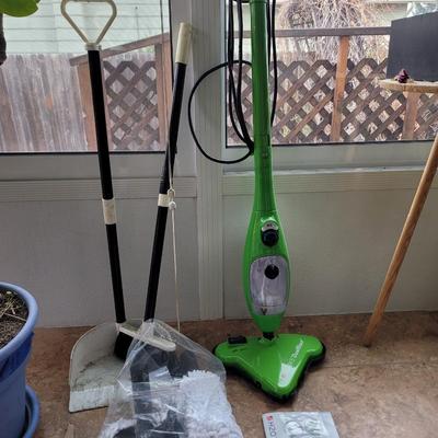 Steam cleaner, pads, booklet and small Broomfield and duatbin