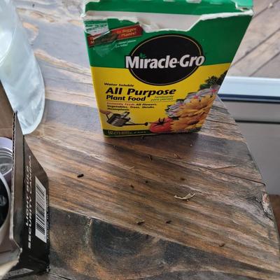 2 small round tables with extras