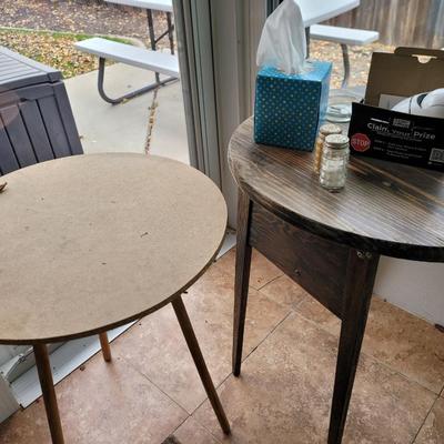 2 small round tables with extras