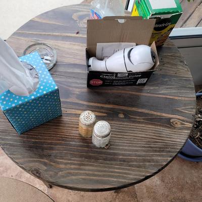 2 small round tables with extras