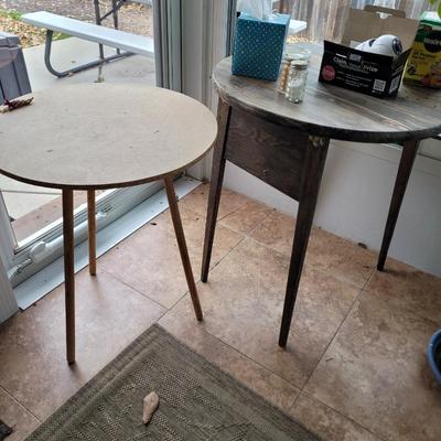 2 small round tables with extras