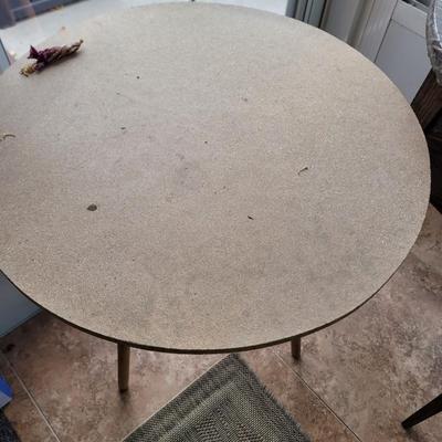 2 small round tables with extras