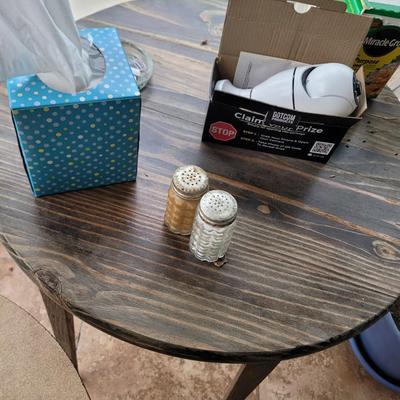 2 small round tables with extras