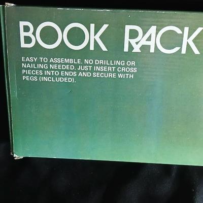 Vintage stone bookends and a wooden book rack brand new in the box