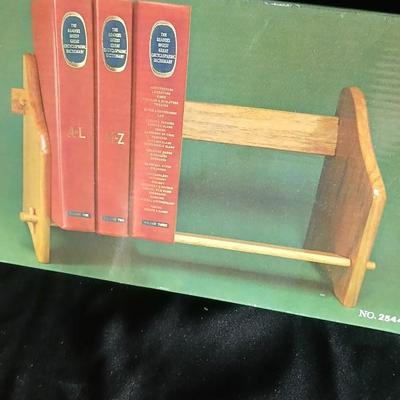 Vintage stone bookends and a wooden book rack brand new in the box
