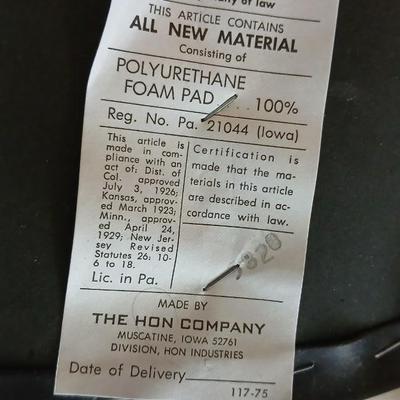 HON Adjustable office chair with a hard desk mat