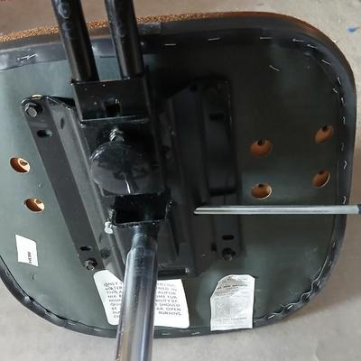 HON Adjustable office chair with a hard desk mat