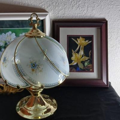 Small touch lamp with framed pictures of Flowers